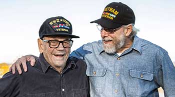 two veterans taking a photo