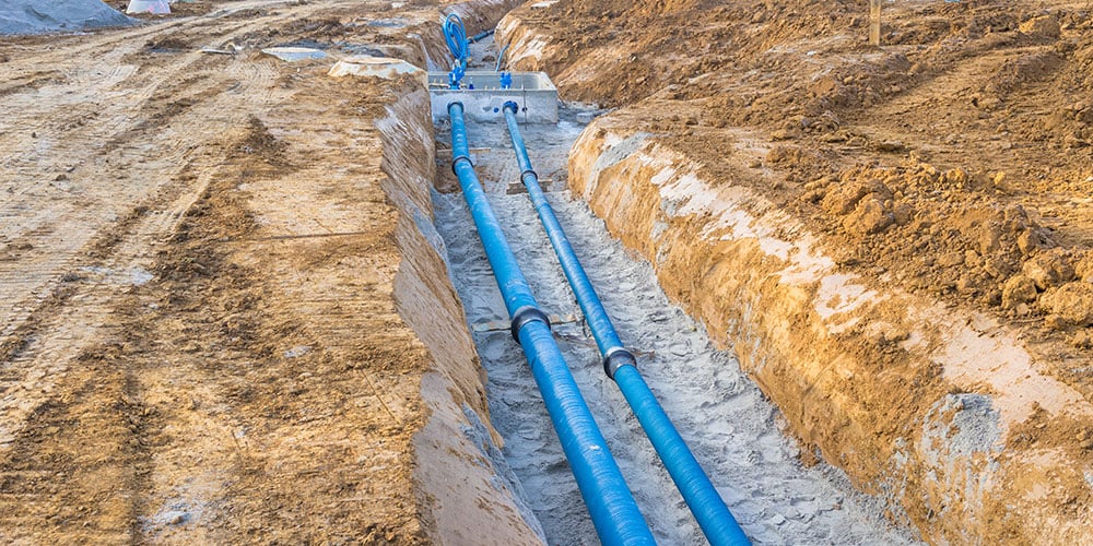 Construction site with new Water Pipes in the ground